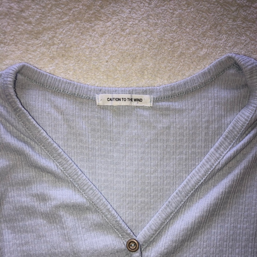 Caution to the Wind button up